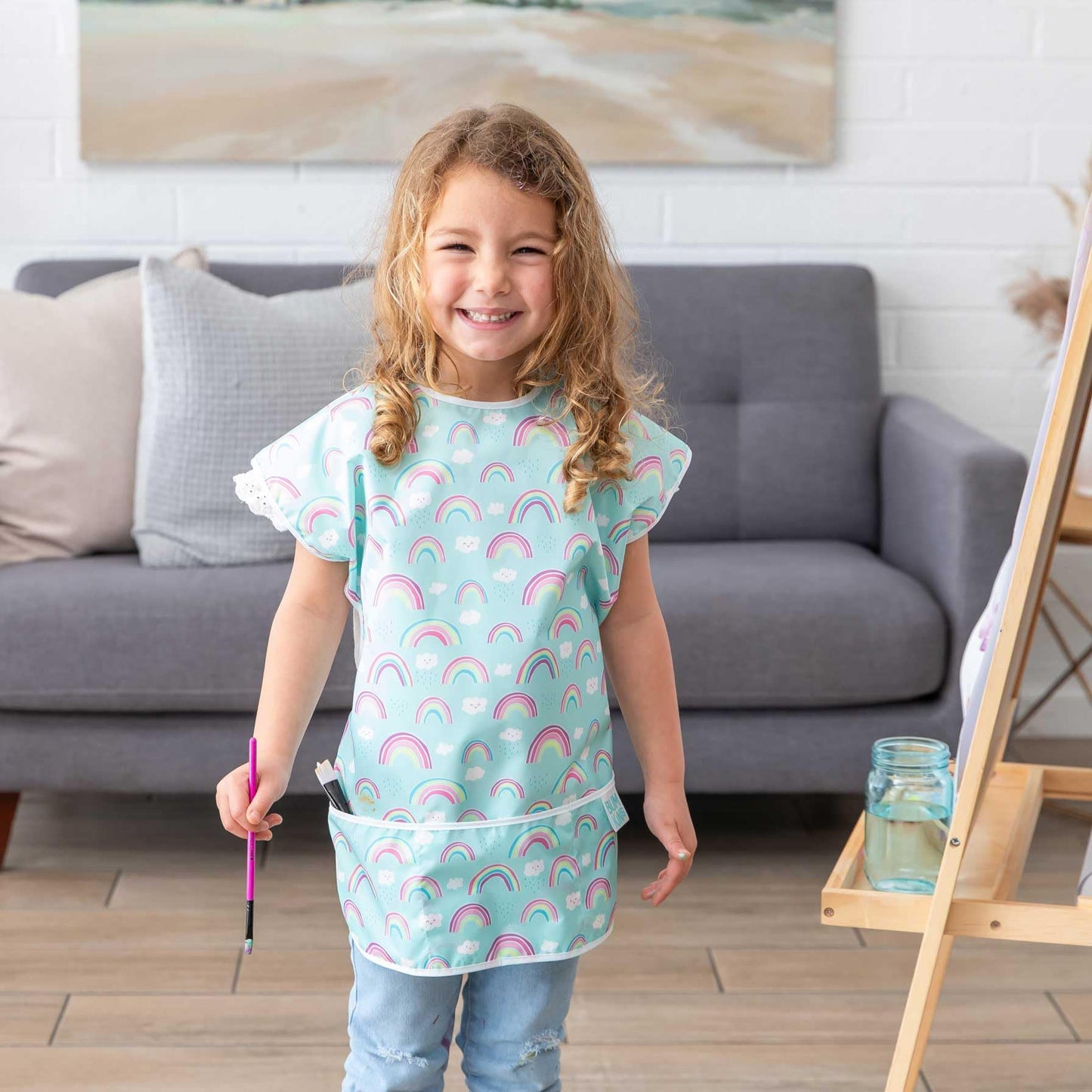 Bumkins Short Sleeve Smock, Toddler Reusable Waterproof Bib For Girls And Boys Ages 3-7 Years, Junior Childrens, Kids Paint Apron, Arts, Crafts And Play With Pocket, Soft Fabric, Rainbows Blue