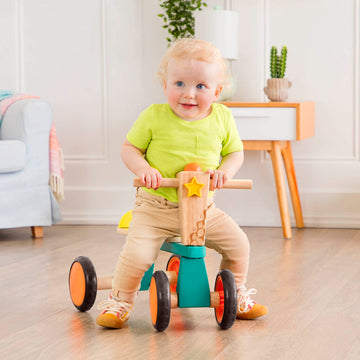 B. Toys- Smooth Rider- Ride On- Wooden Toddler Bike – Balance Toys For Toddlers – Push & Ride Bike – Four Wheels – 18 Months +, Large, Multicolor