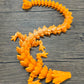 Munnygrubbers - Xl 26' Crystal Dragon Fidget Toy - Heavy Duty - 3D Printed Flexible Articulating Dragon Plastic Collectible Figurine - Surprise Egg Compatible - (Orange Dragon)