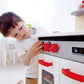 Hape Gourmet Kitchen Toy Fully Equipped Wooden Pretend Play Kitchen Set with Sink  Stove  Baking Oven  Cabinet  Turnable Knobs & Spice Shelf  White