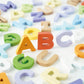 Le Toy Van - Wooden Letters In A Bag Toy, Plastic Free | Suitable For Age 18+ Months