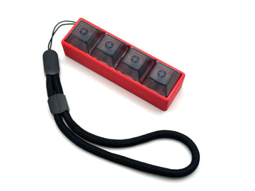 Four-Button Clicky Mechanical Switch Fidget Toy | Stim Toy, Stress Relief, Adhd (Red Base, Transparent Black Keycaps)