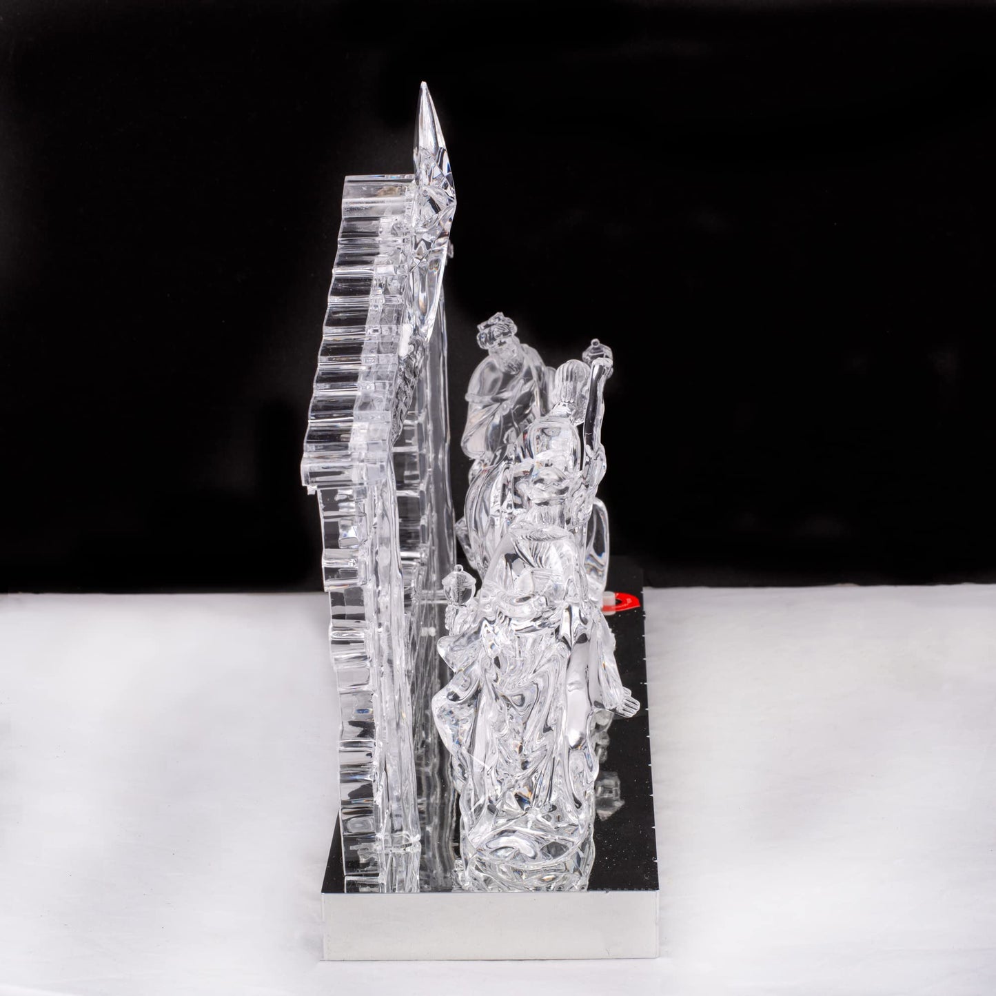 Kurt S. Adler 8.7-Inch Battery-Operated Light-Up Musical Clear Nativity Scene