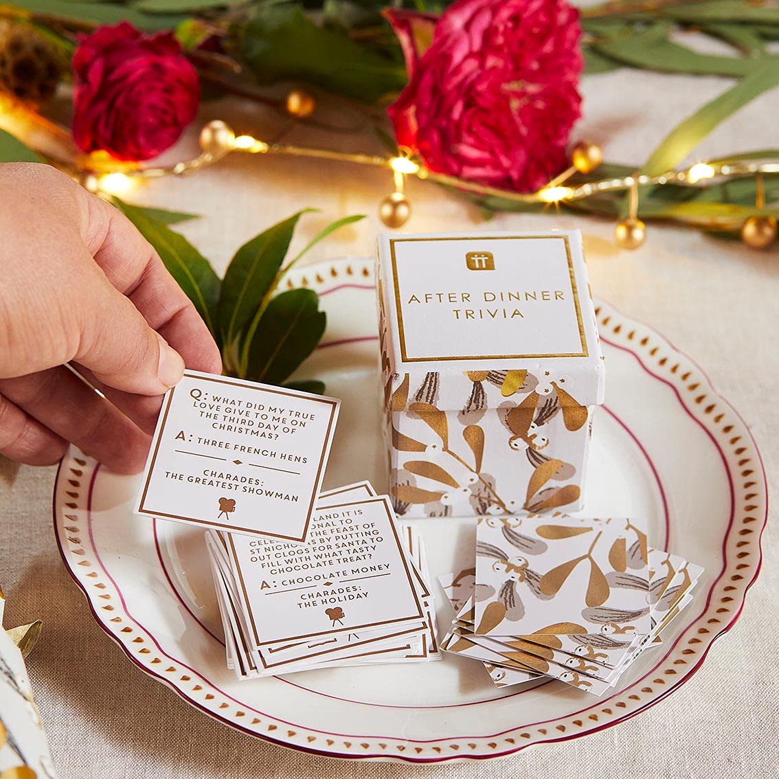 Talking Tables Christmas Trivia Quiz Questions & Charades Cards | After Dinner Table Game in Mistletoe Box | Xmas Gifts for Him or Her  Stocking Stuffer  Gold