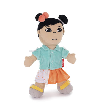 Fastening Dolls Asian Girl