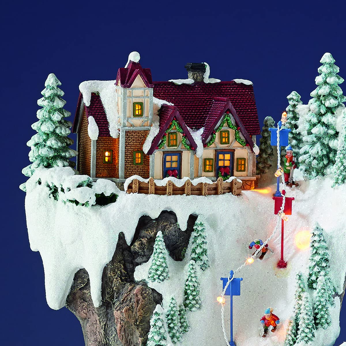 MOMENTS IN TIME Animated Ski Resort Christmas Village, 20.5”H, LED Lights, Music & Moving Train, Hand-Painted Resin, Model NM-X16038AA