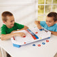 International Playthings Electronic Table-Top Air Hockey - Fast-Paced Sports Fun In An Easily Portable Battery-Operated Rink For Ages 5 And Up (P25118)