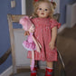 TERABITHIA 24 Inches 60CM Sweet Face Real Baby Size Rooted Blond Curly Hair Lifelike Reborn Baby Doll with Soft Weighted Cloth Body Realistic Newborn Toddler Girl Dolls That Look Real and Feel Real