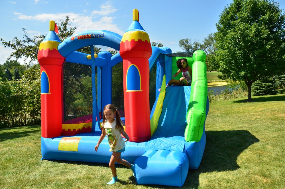 Bounceland Royal Palace Inflatable Bounce House [Blower NOT Included], Long Slide, Large Bouncing Area, Basketball Hoop and Sun