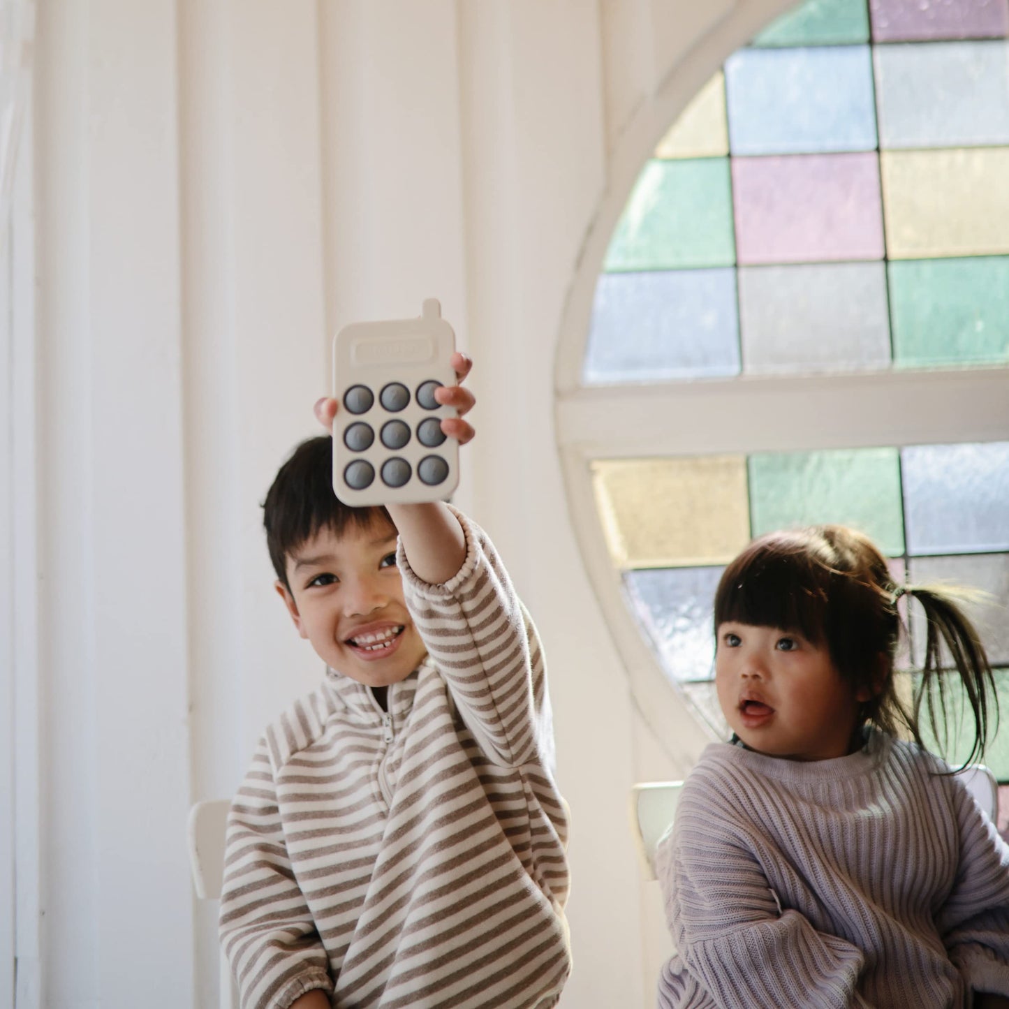 Mushie Phone Press Toy (Tradewinds)