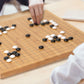 Yellow Mountain Imports Bamboo 0.8-Inch Reversible 19x19 / 13x13 Go Game Set Board with Double Convex Melamine Stones and Bamboo
