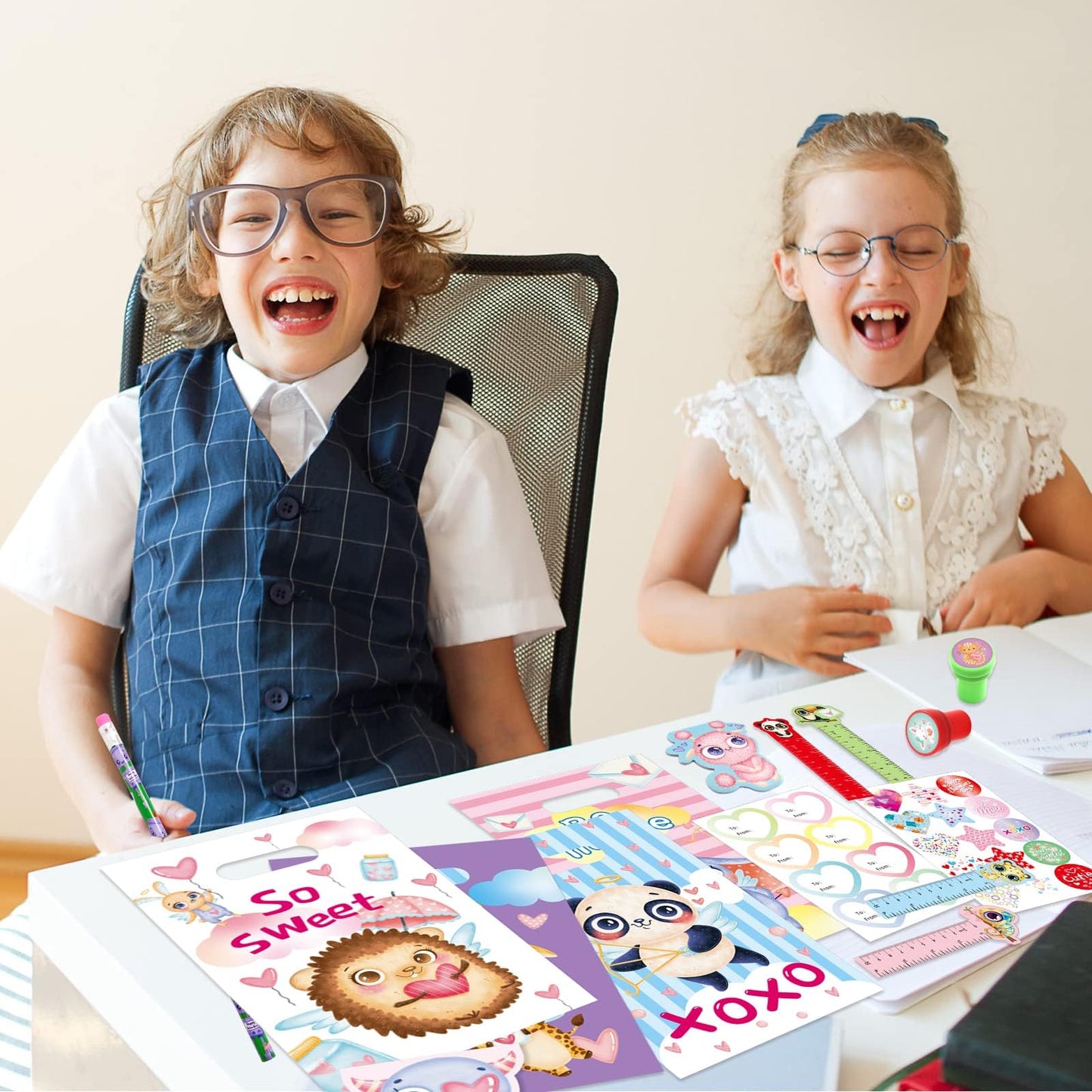 ceiba tree 24 Pack Valentines Day Stationery Gift Set with Treat Bags Stamps Pencils Stickers Rulers Notepad for Kids Party Favo