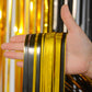 Melsan Foil Curtain Tinsel Backdrop - 3.2ft X 8ft Black and Gold Fringe Curtain Photo Streamers Backdrop for Halloween, Graduati