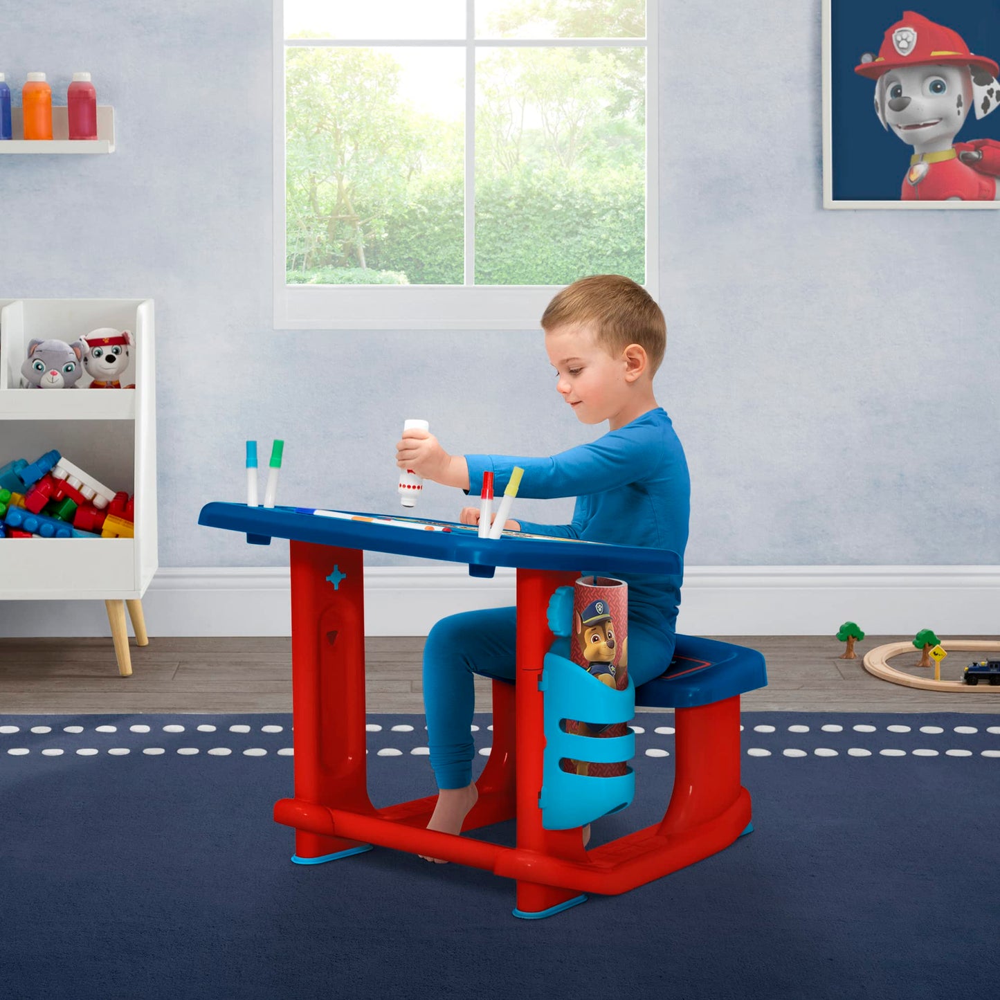 Delta Children PAW Patrol Draw and Play Desk – Compact Blue Plastic, Includes 10 Markers & Coloring Book, Model TT87445PW-1121