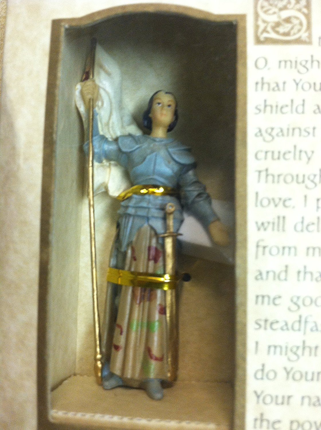 Roman Joan of Arc in protective covering with Flag Patrons and Protectors Figurine