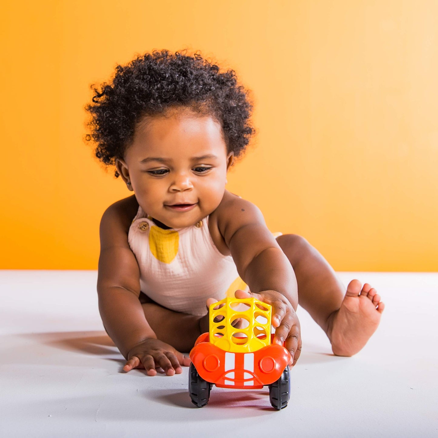 Bright Starts Oball Rattle & Roll Buggie, BPA-Free Rubber Toy, 1 Count, Red/Yellow, 3 Months+