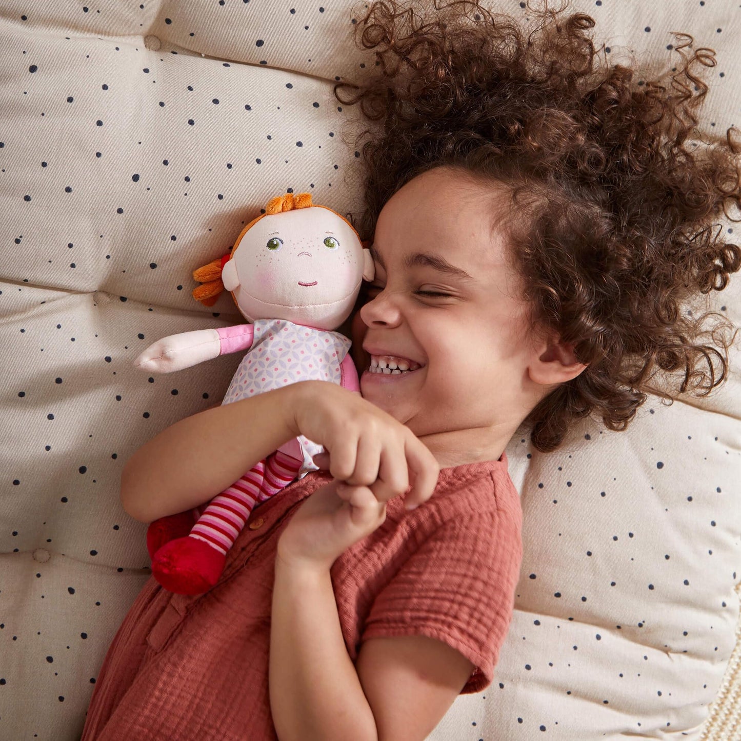 HABA Soft Baby Doll Roya - 10" Machine Washable Polyester Doll with Red Pigtails in Pink Dress - Ideal for 2 Year Old Girls
