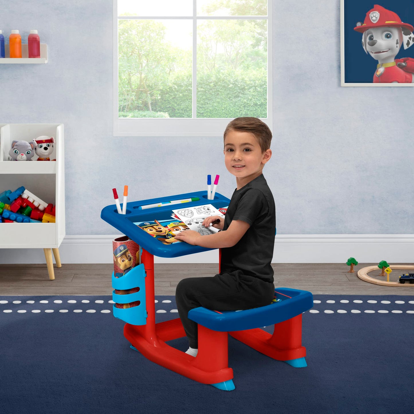 Delta Children PAW Patrol Draw and Play Desk – Compact Blue Plastic, Includes 10 Markers & Coloring Book, Model TT87445PW-1121