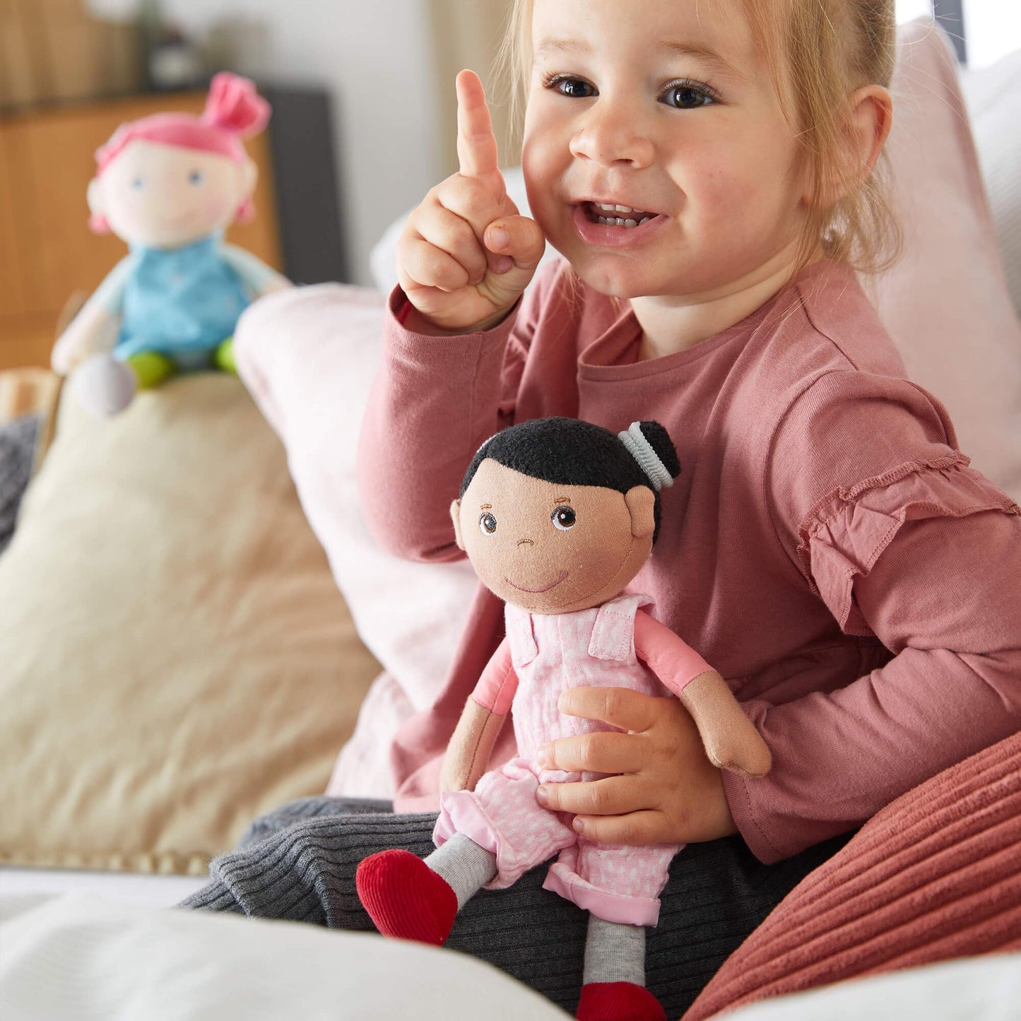 Haba Snug Up Doll Rumbi - 10'' Soft Doll With Black Hair And Pink Overalls - Machine Washable For 18 Months And Up