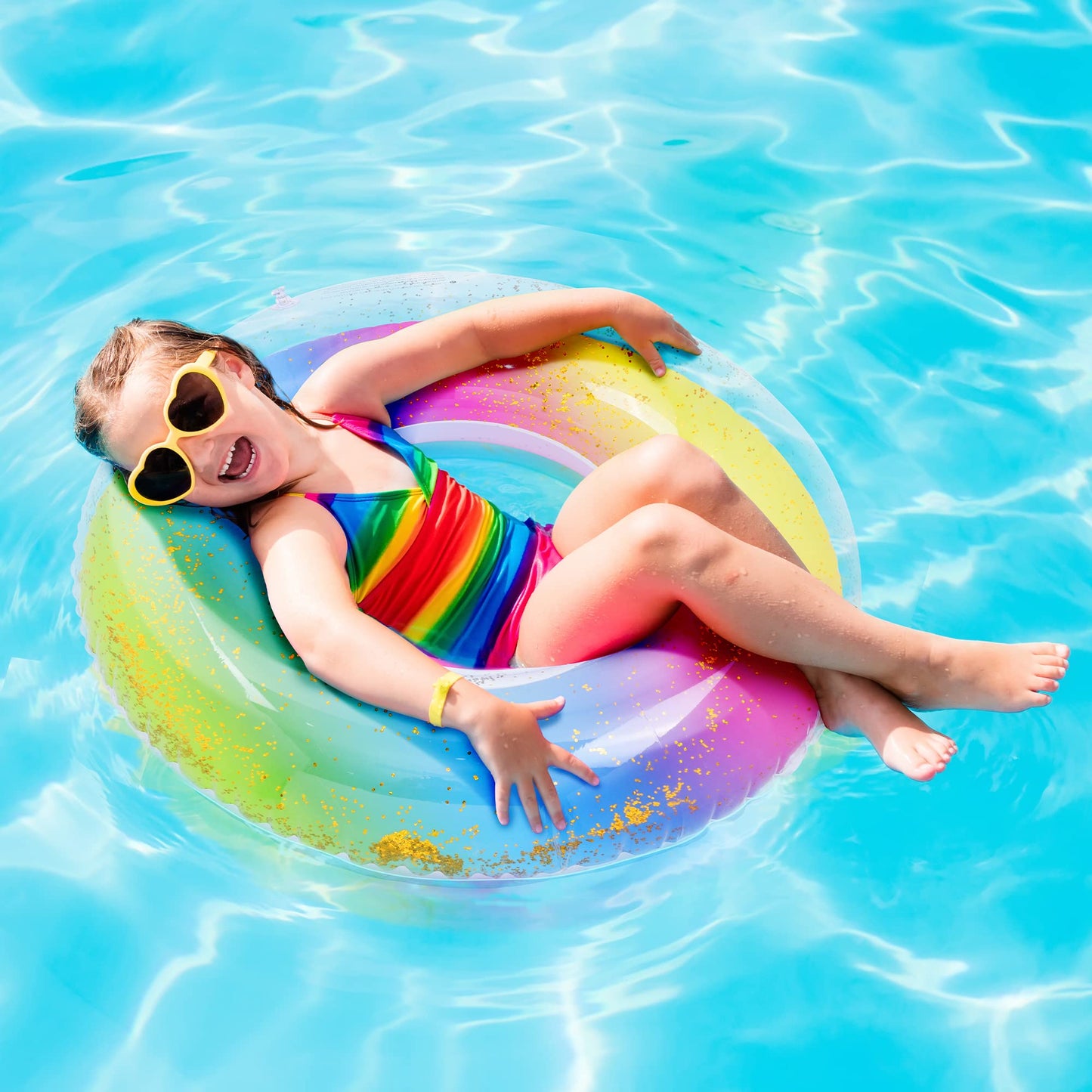 Elcoho 8 Pieces 36 Inches Inflatable Pool Floats Colorful Glitter Pool Tubes Transparent Swimming Ring Pool Floats Toy for Summer Beach  Pool Supplies
