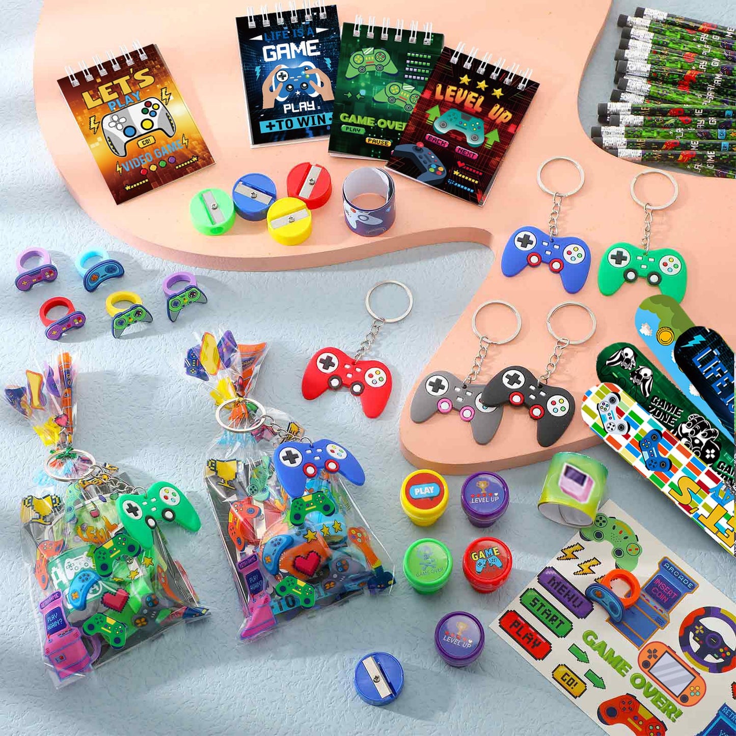 Sayglossy 331 Pcs Video Game Party Favors Set Includes Gift Bags Pencils Notebook Sharpener Slap Bracelets Rings Keychains Tatto