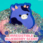Squishmallows Ingrid The Cow Cloud Slime, 8 oz, Blueberry-Scented, Multi-Color Storage Container with Figurine Topper, Model 228940
