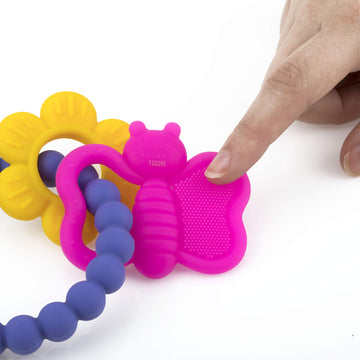 Nuby Chewy Charms Silicone Teether With Butterfly/Flower Or Coral Unicorn, 1 Count (Pack Of 1)