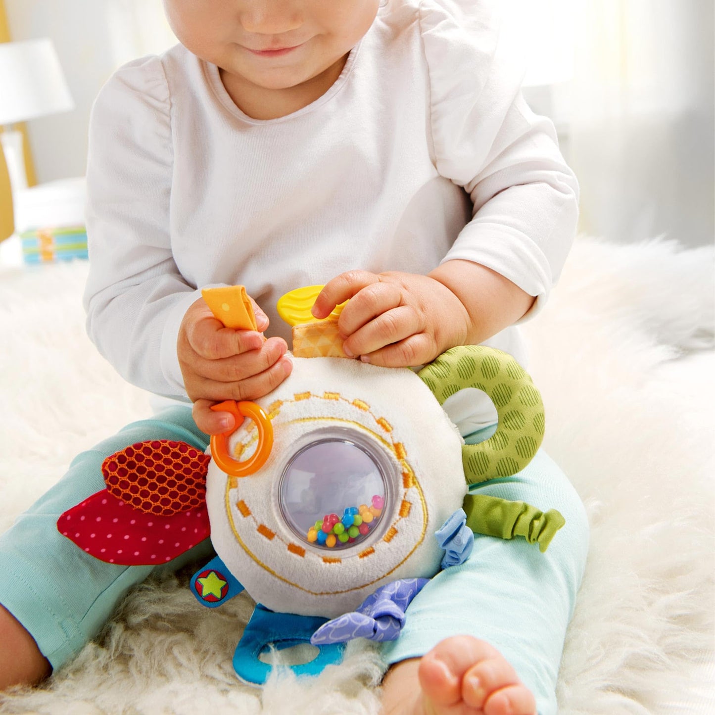 HABA Teether Cuddly Rainbow Round - Soft Multicolor Activity Toy with Rattling & Teething Elements, Model 301670