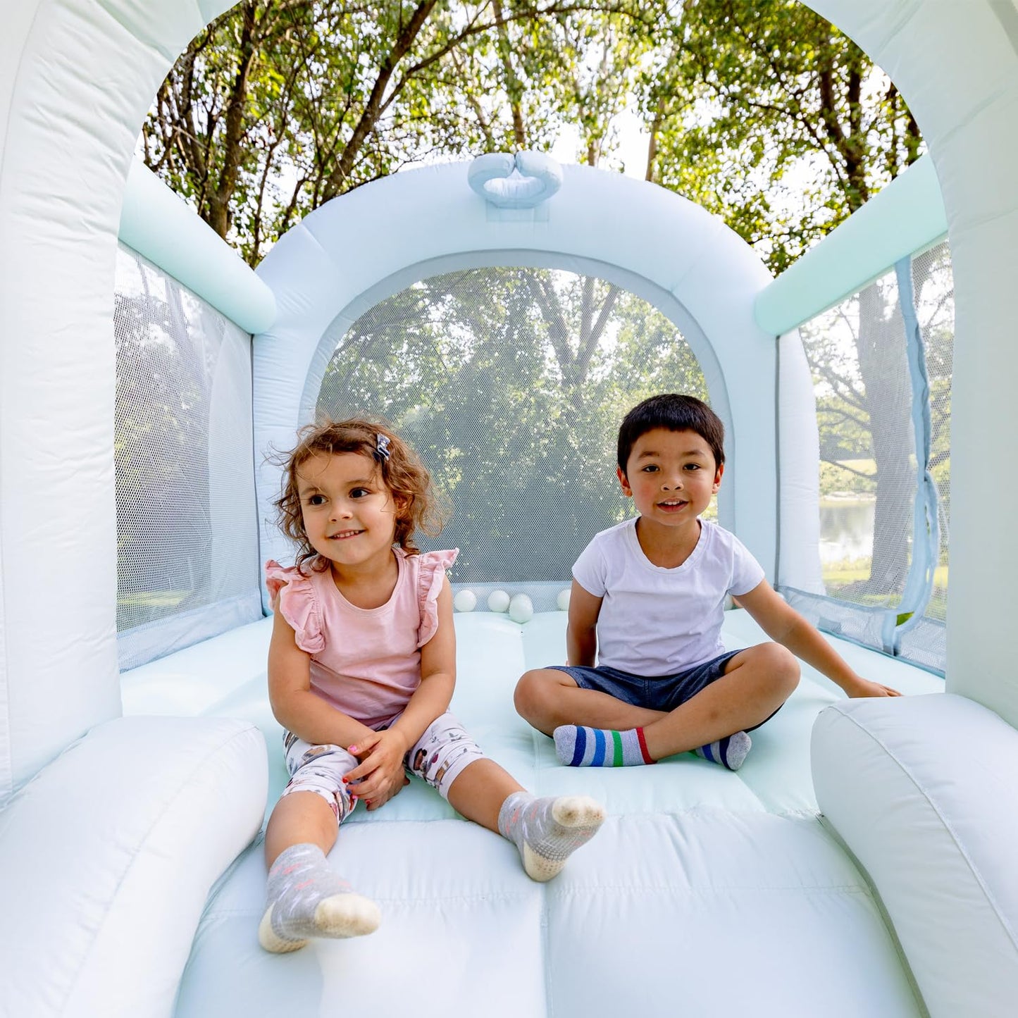 Bounceland Daydreamer Mist Bounce House, Pastel Bouncer With Slide, 8.9 Ft L X 7.2 Ft W X 6.7 Ft H, Ul Blower Included, Basketball Hoop, 30 Pastel Plastic Balls, Trendy Bouncer For Kids