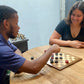 We Games Checkers Pieces Only, Wooden Checker Board Game Pieces, 24 Red And Black Stackable Pieces, Drawstring Storage Bag, 1.062 Diameter