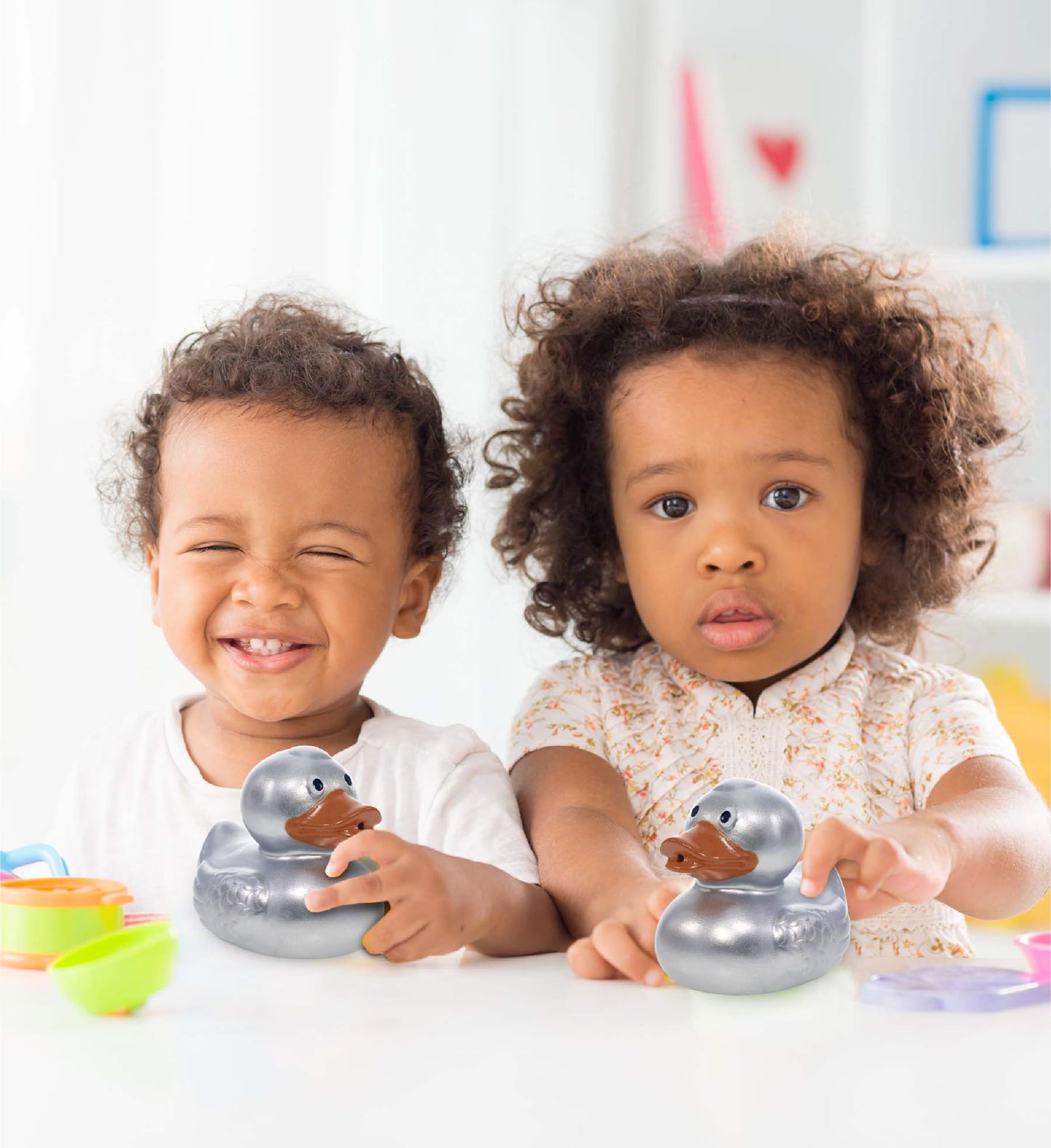 DolliBu Metallic Silver Duck Bath Buddy Squirter - Floating Silver Duck Rubber Bath Toy  Fun Water Squirting Bath Time Play for Toddlers  Animal Toy for Bathtub  Beach  and Pool for Girls and Boys