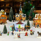 MOMENTS IN TIME Christmas Village 30-Piece Miniature Set with LED Lights, Handcrafted Polyresin Houses & Figurines, Model NM-X18080AA-S30