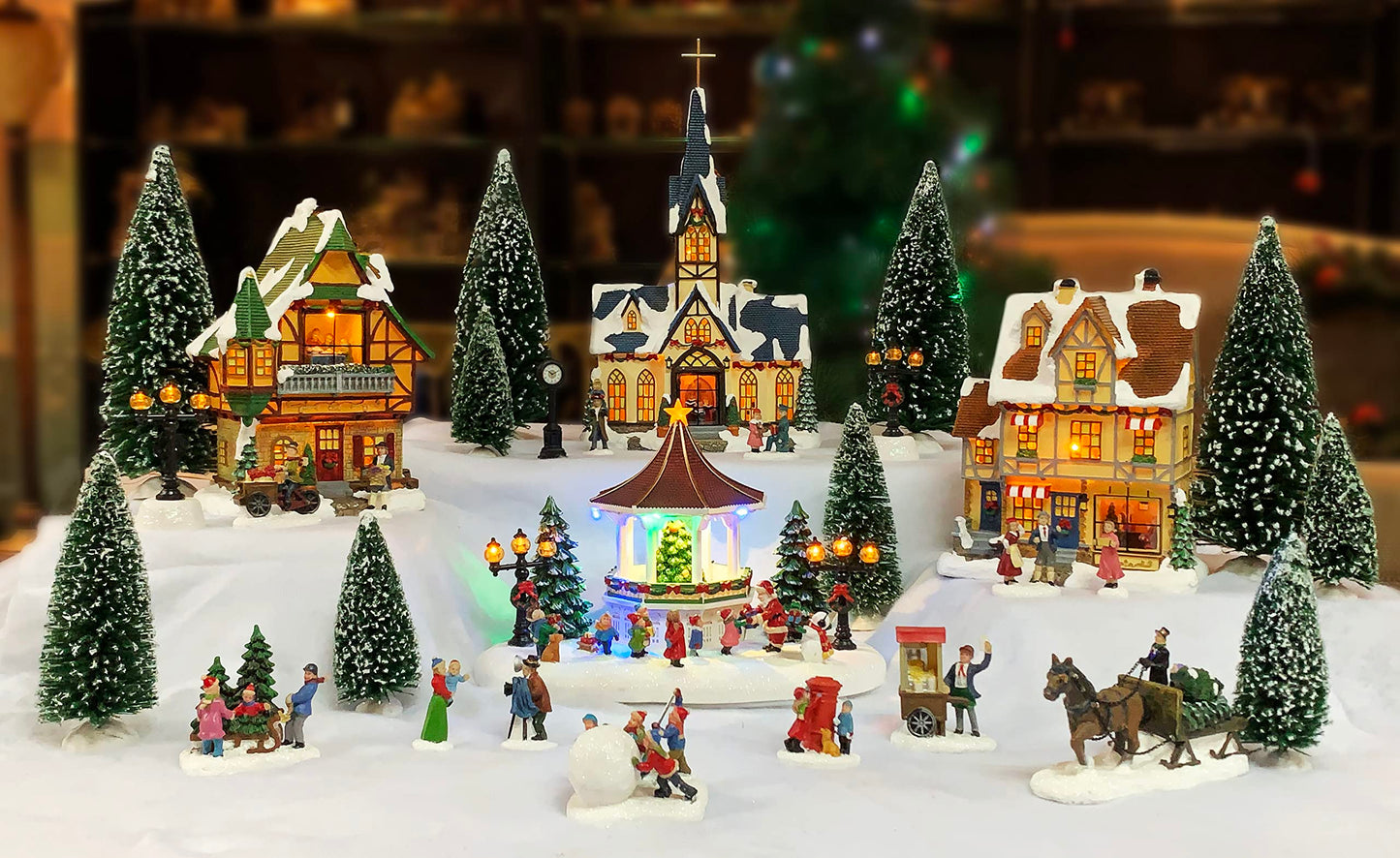 MOMENTS IN TIME Christmas Village 30-Piece Miniature Set with LED Lights, Handcrafted Polyresin Houses & Figurines, Model NM-X18080AA-S30