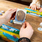AEG Cascadia Junior Board Game - 2-4 Players, Ages 6+, Cardboard, Blue, Model AEG-1023