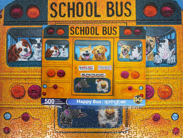 Springbok Happy Bus 500 Piece Jigsaw Puzzle For Adults And Kids - Dog Lovers Will Enjoy This Illustration By Artist Carol Luz Of Lots Of Happy Dogs On The Schoolbus.