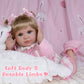 EKOKIZ Realistic Baby Doll 22-Inch Newborn Baby Doll Soft Cloth Body Lifelike Reborn Baby Dolls Cute Girls with Clothes and Toy