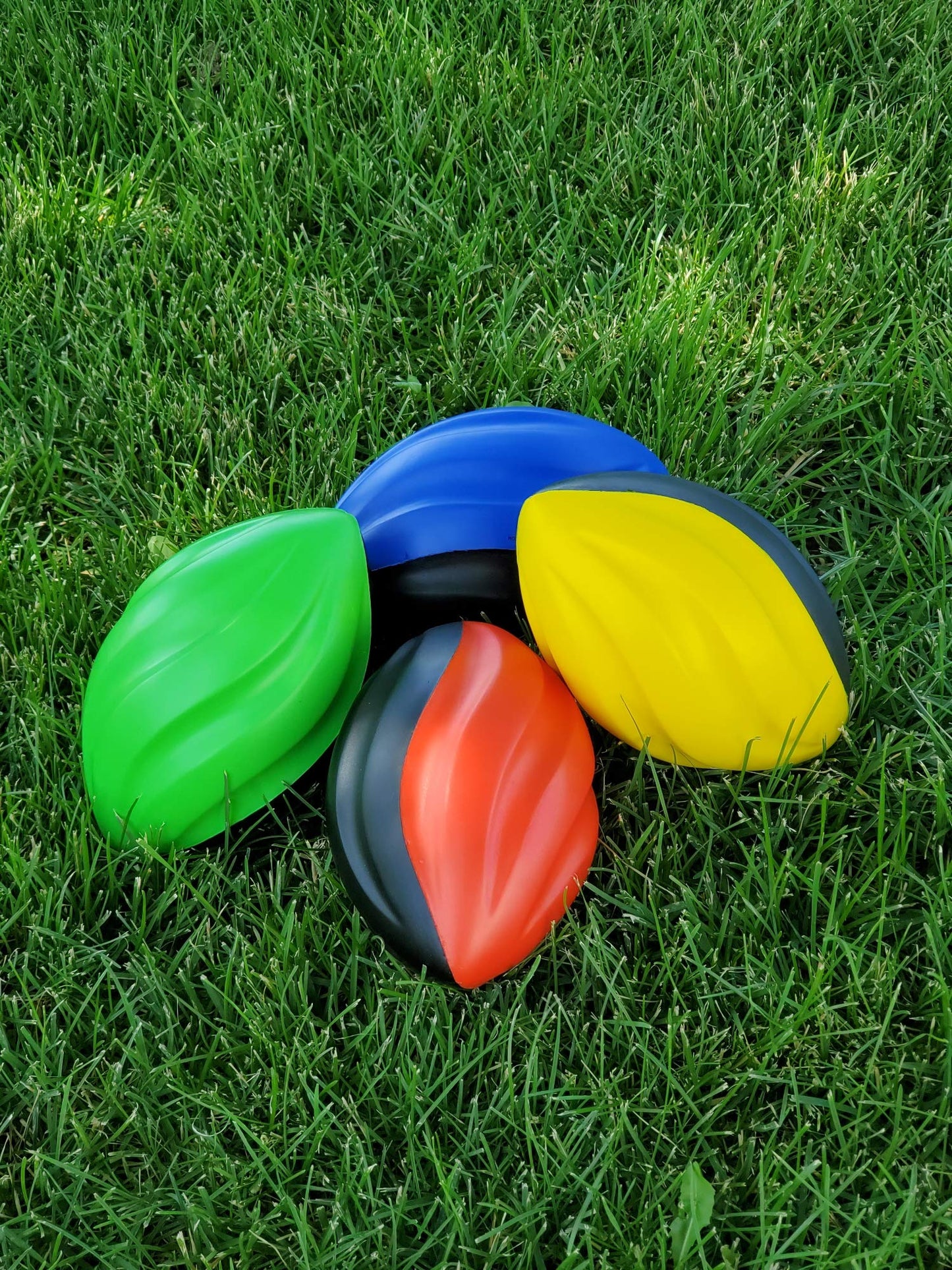 Lmc Products 7' Spiral Mini Football For Kids 4 Pack - Kids Football - Foam Footballs For Kids - Soft, Small Footballs For Kids (Red, Yellow, Blue And Green)