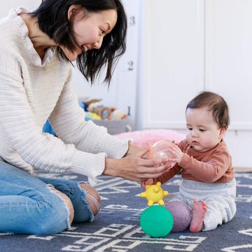 Infantino Activity Ball Set Music & Lights - 4 Colorful, Bouncy, & Multi-Textured Balls For Fine Motor Development For Little Hands