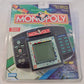 Hasbro Monopoly Electronic Handheld Game - Interactive LCD - 6"x7.1"x1.5"