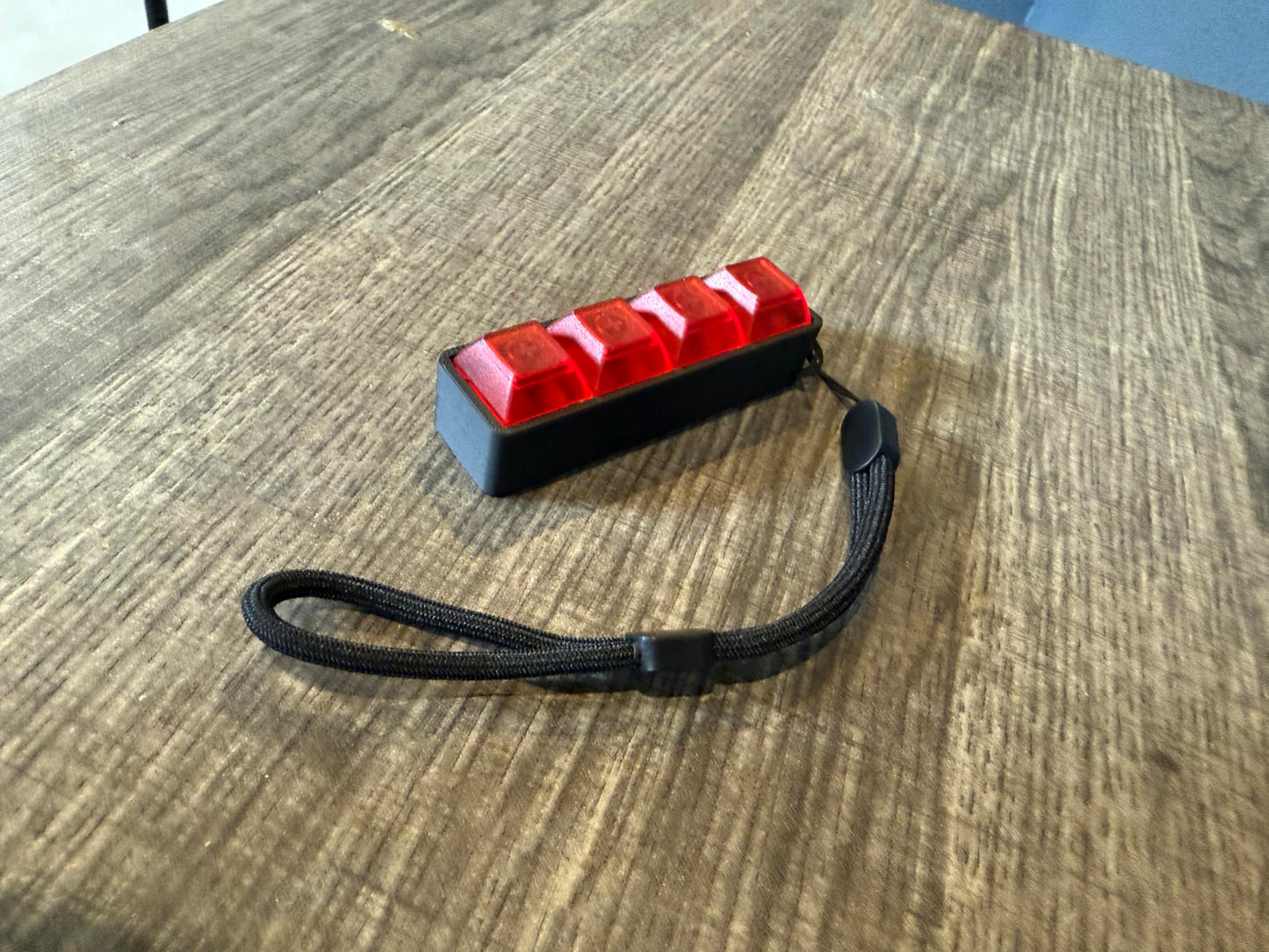 Four-Button Clicky Mechanical Switch Fidget Toy | Stim Toy, Stress Relief, Adhd (Black Base, Transparent Red Keycaps)