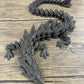 Munnygrubbers - Xl 26' Crystal Dragon Fidget Toy - Heavy Duty - 3D Printed Flexible Articulating Dragon Plastic Collectible Figurine - Surprise Egg Compatible - (Shiny Black Dragon)