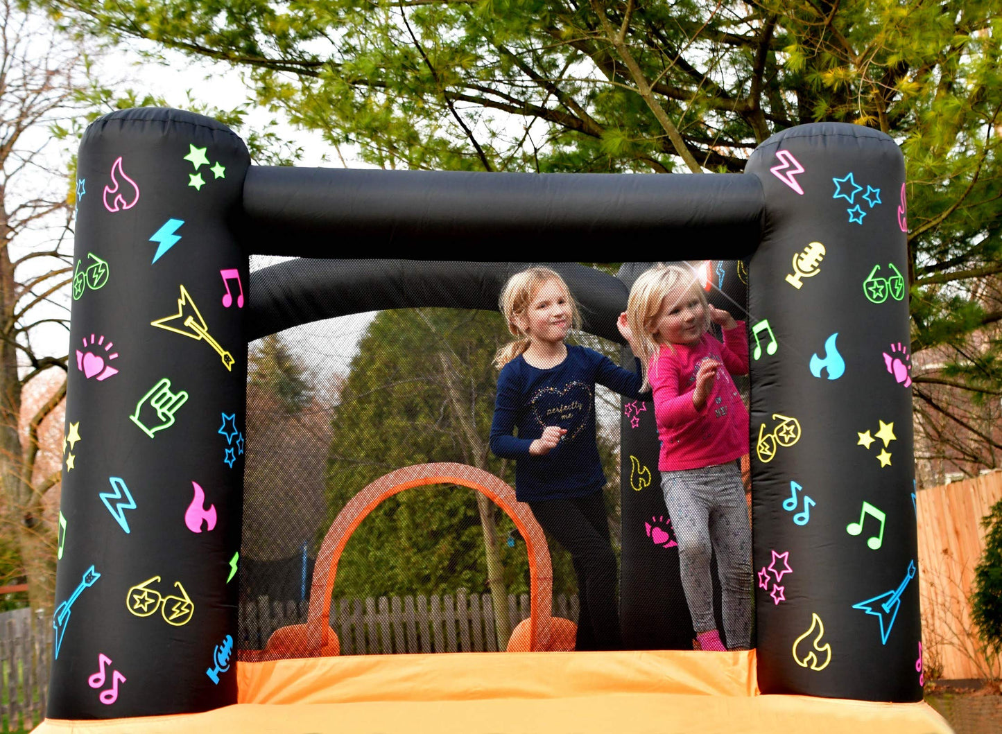 Bounceland Kidz Rock Bounce House - Inflatable Bouncer with Music & Lights, 9ft L x 7ft W x 5.5ft H, Orange & Black, Model