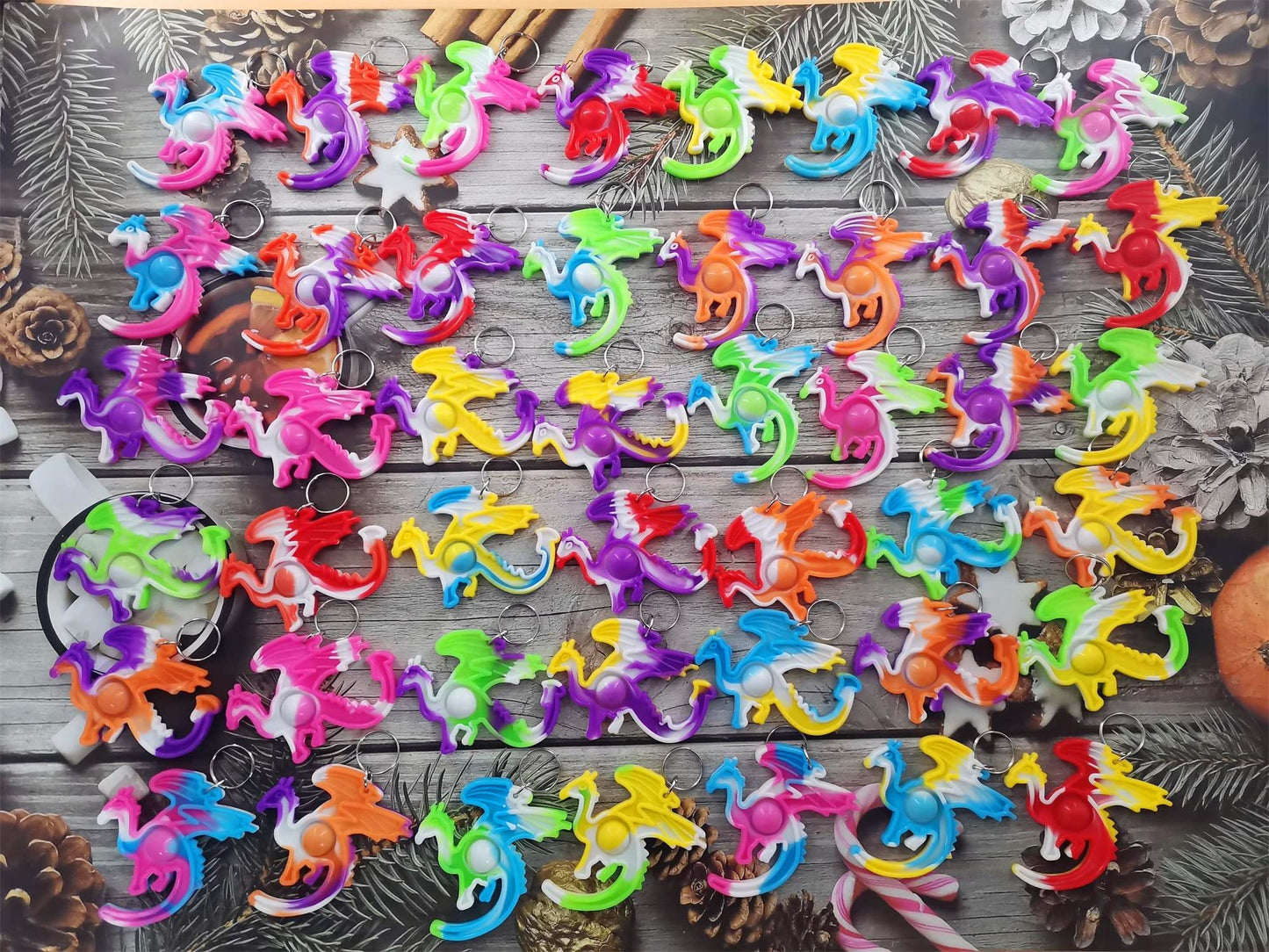 100 Packs Dragon Bulk Mini pop Fidget Gifts for Holiday Boys and Girls Kids Party Favors Supplies and Classroom Students Prize