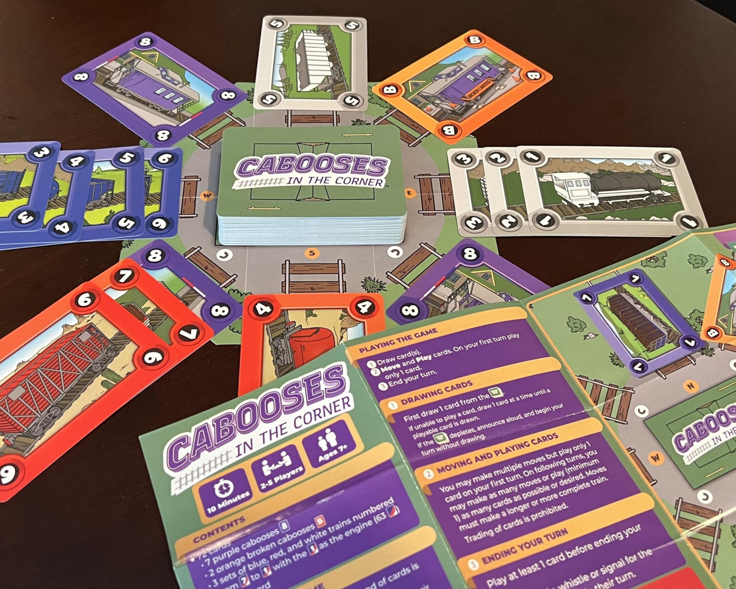 Cabooses In The Corner - Easy, Fun, & Educational Train Building Card Game - 2-5 Players - Colors, Numbers - English, Spanish - Ages 7+