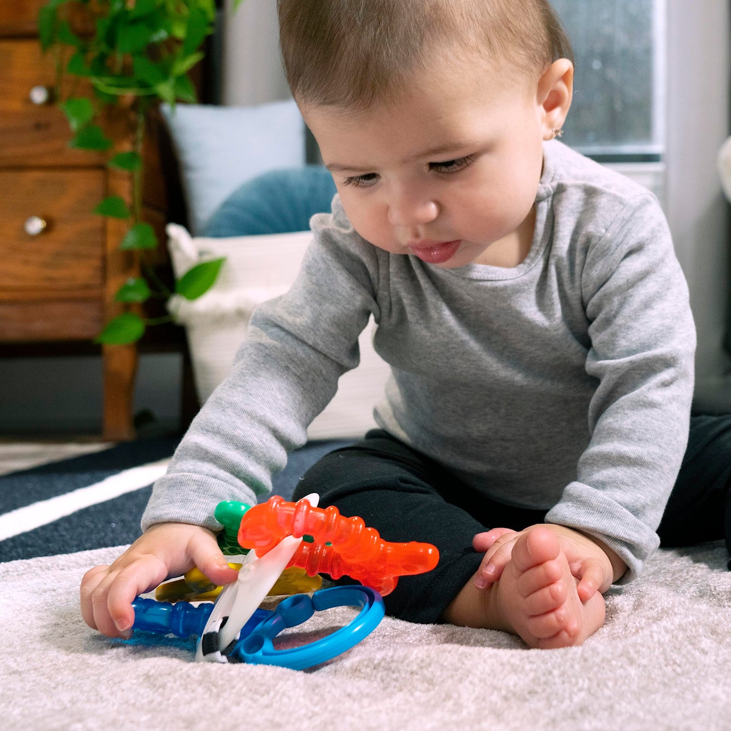 Baby Einstein Ocean Explorers Teether Toy, BPA-Free Plastic, 9.1"x6.5"x2.5", Ages 3 Months+, Sea of Sensory Design, Model 13158