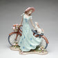 Cosmos Gifts 10414 Fine Elegant Porcelain Lady Riding Bike With My Best Friend Dog Puppy Porcelain Figurine, 10 5/8' H