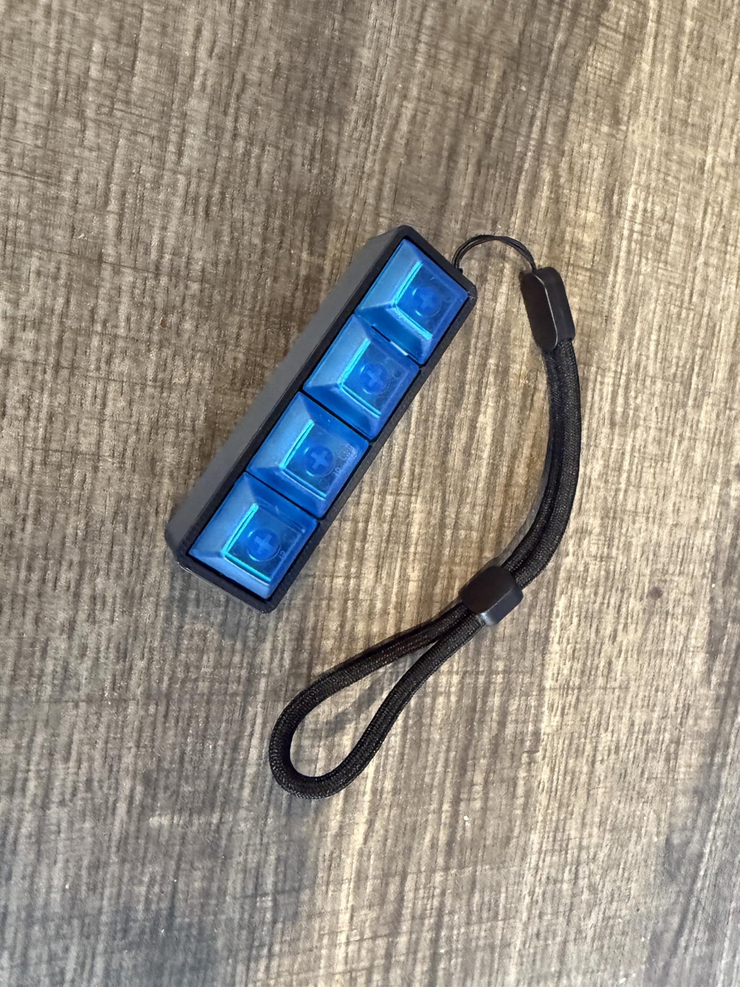 Four-Button Clicky Mechanical Switch Fidget Toy | Stim Toy, Stress Relief, Adhd (Black Base, Transparent Blue Keycaps)