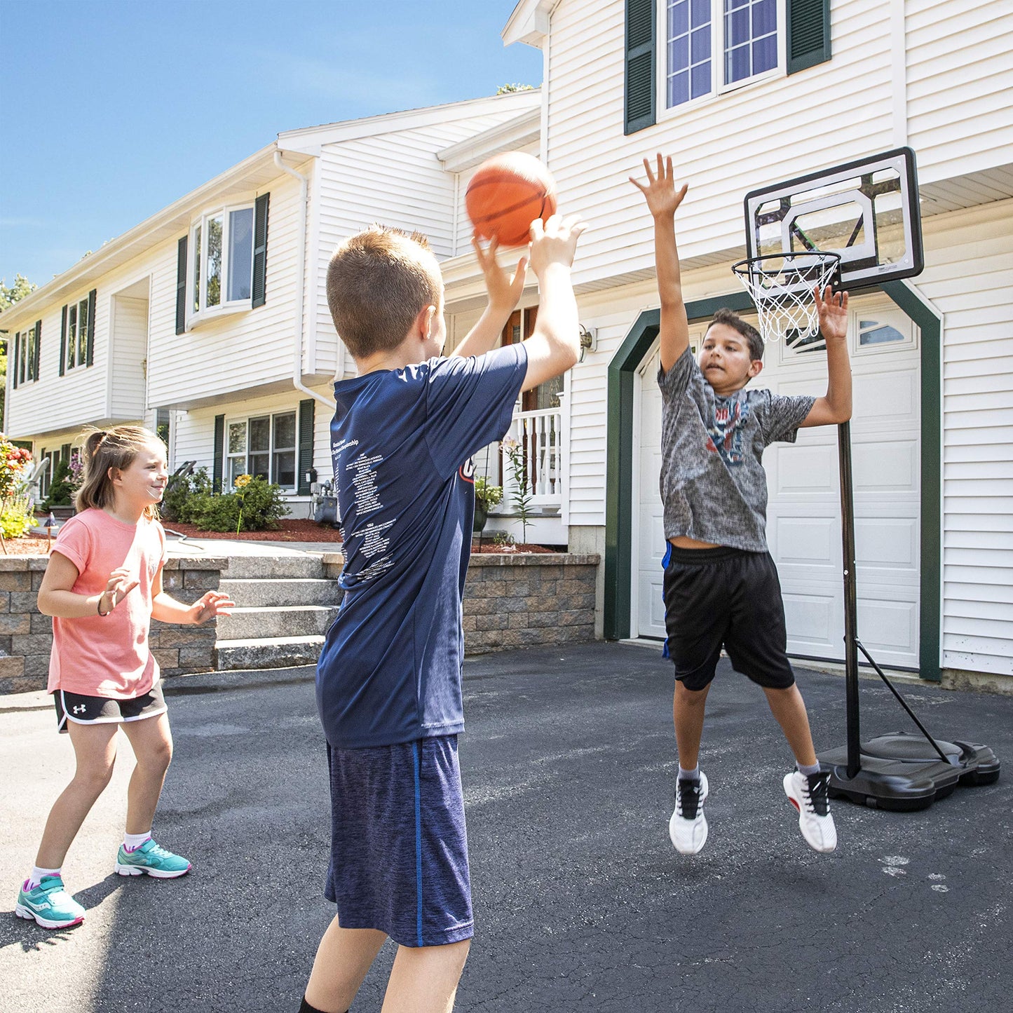 Franklin Sports Youth Basketball Hoop - Adjustable Portable Indoor/Outdoor System, 5' to 7' Height, 30 Backboard, Black/White