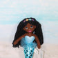 A Dark Brown Skin Tone Mermaid Doll