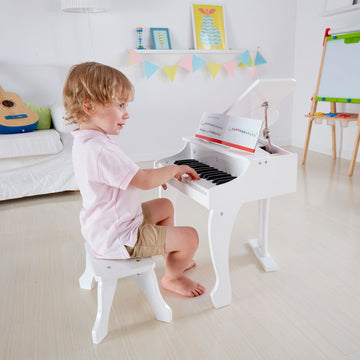 Hape Deluxe White Grand Piano | Thirty Key Piano Toy With Stool, Electronic Keyboard Musical Toy Set For Kids 3 Years+
